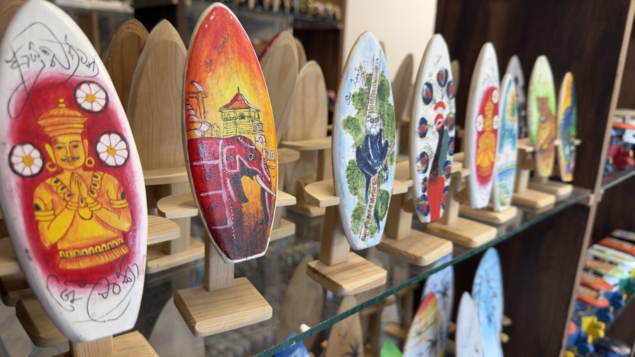 Hand-painted surfboard souvenirs at Sri Shop